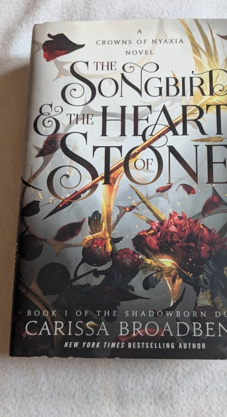 The Songbird & the Heart of Stone: The Shadowborn Duet: Crowns Of Nyaxia HC